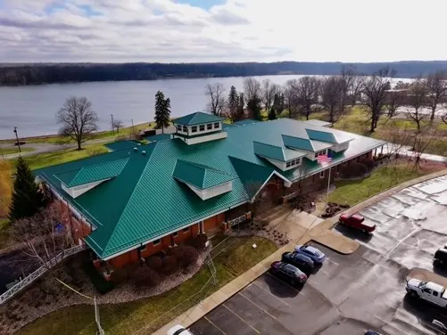 Tarping and dry-in on a Crooked Stick commercial roof